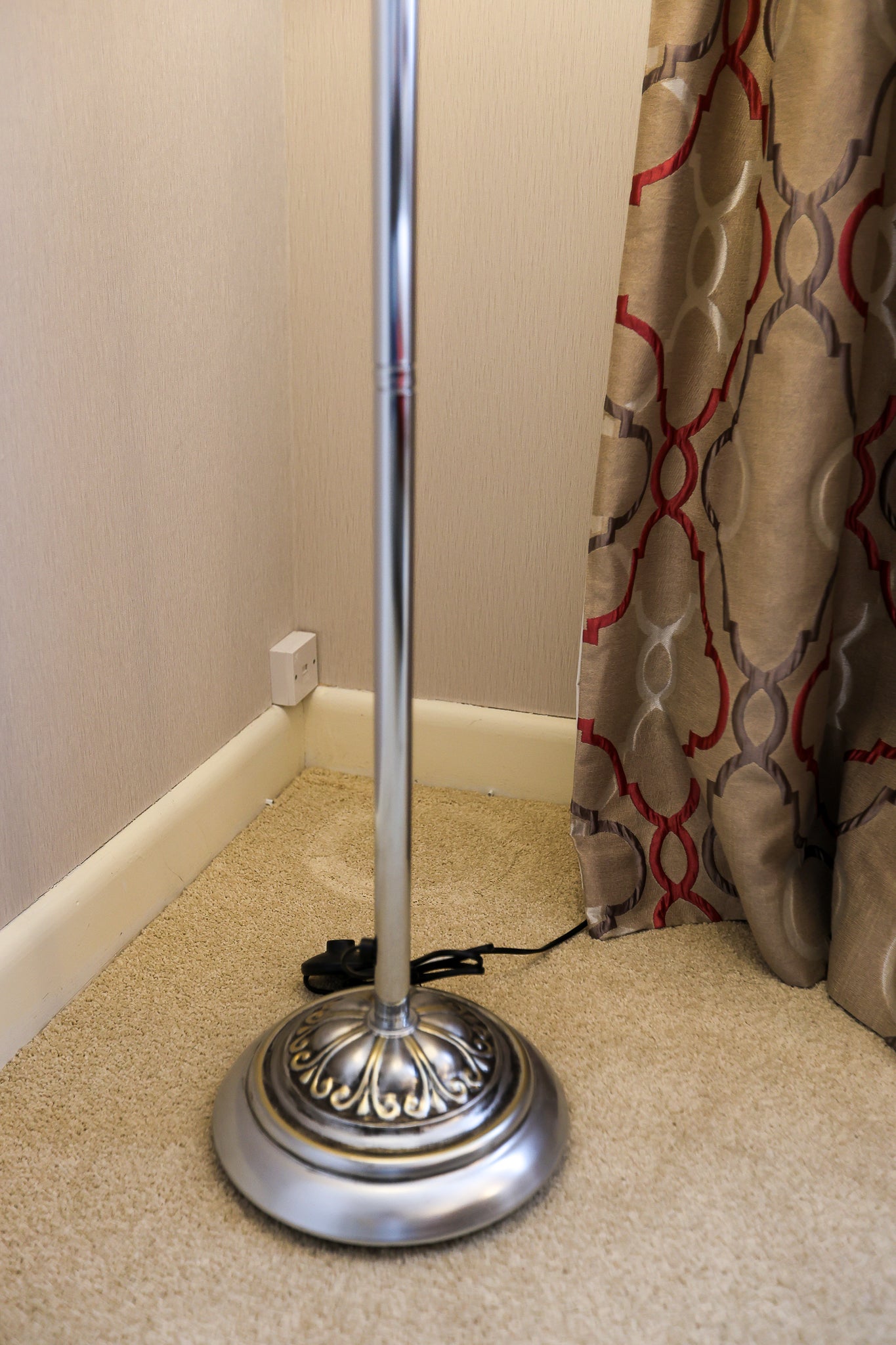 Elegant Silver Floor Lamp with Textured Shade and Ornate Detail