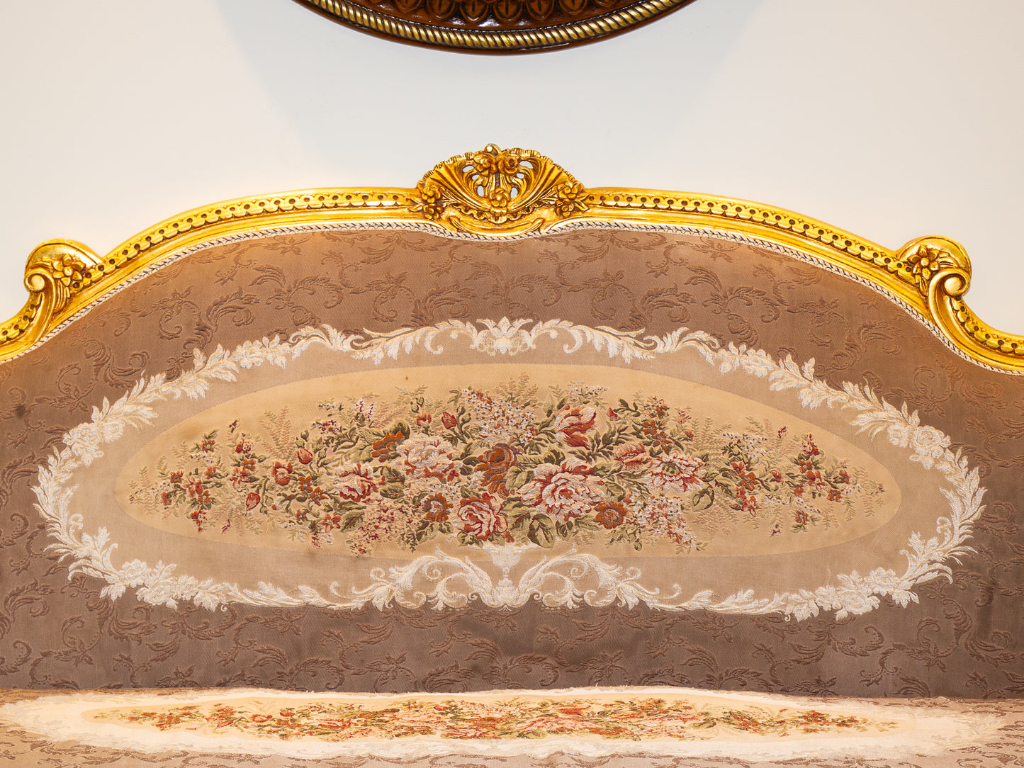 Grand Baroque-Style Gilt Sofa with Floral Embroidery and Tufted Accents