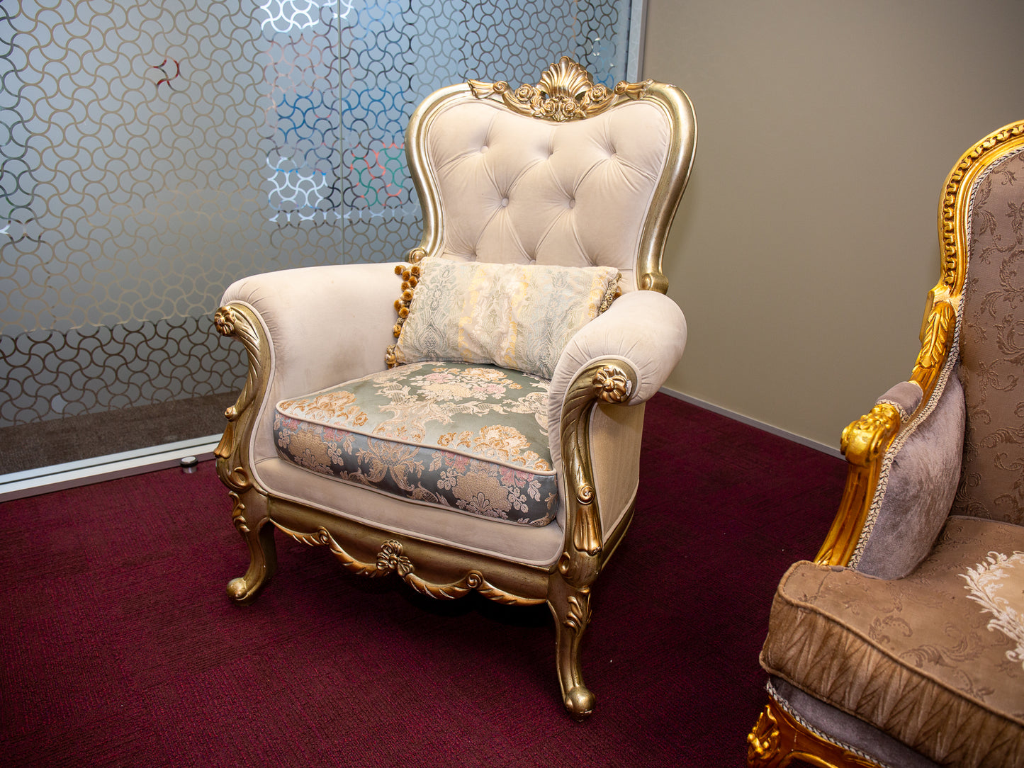Luxurious Baroque-Inspired Gilt Armchair with Tufted Back and Patterned Upholstery