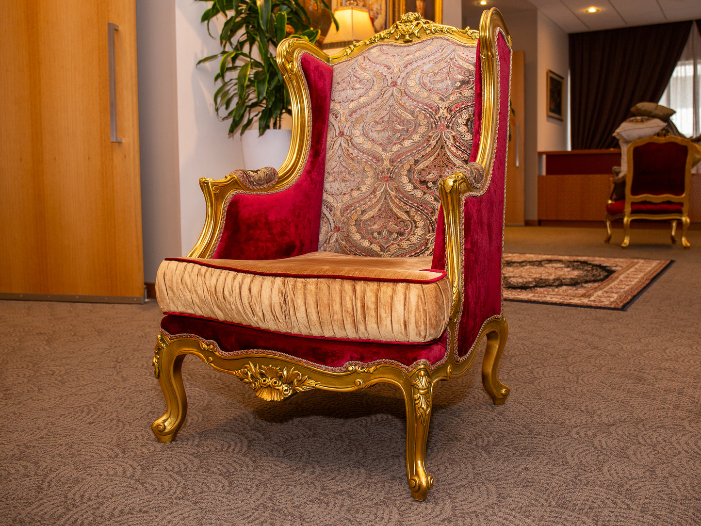 Majestic Baroque-Style Gilt High-Back Armchair with Patterned and Velvet Upholstery