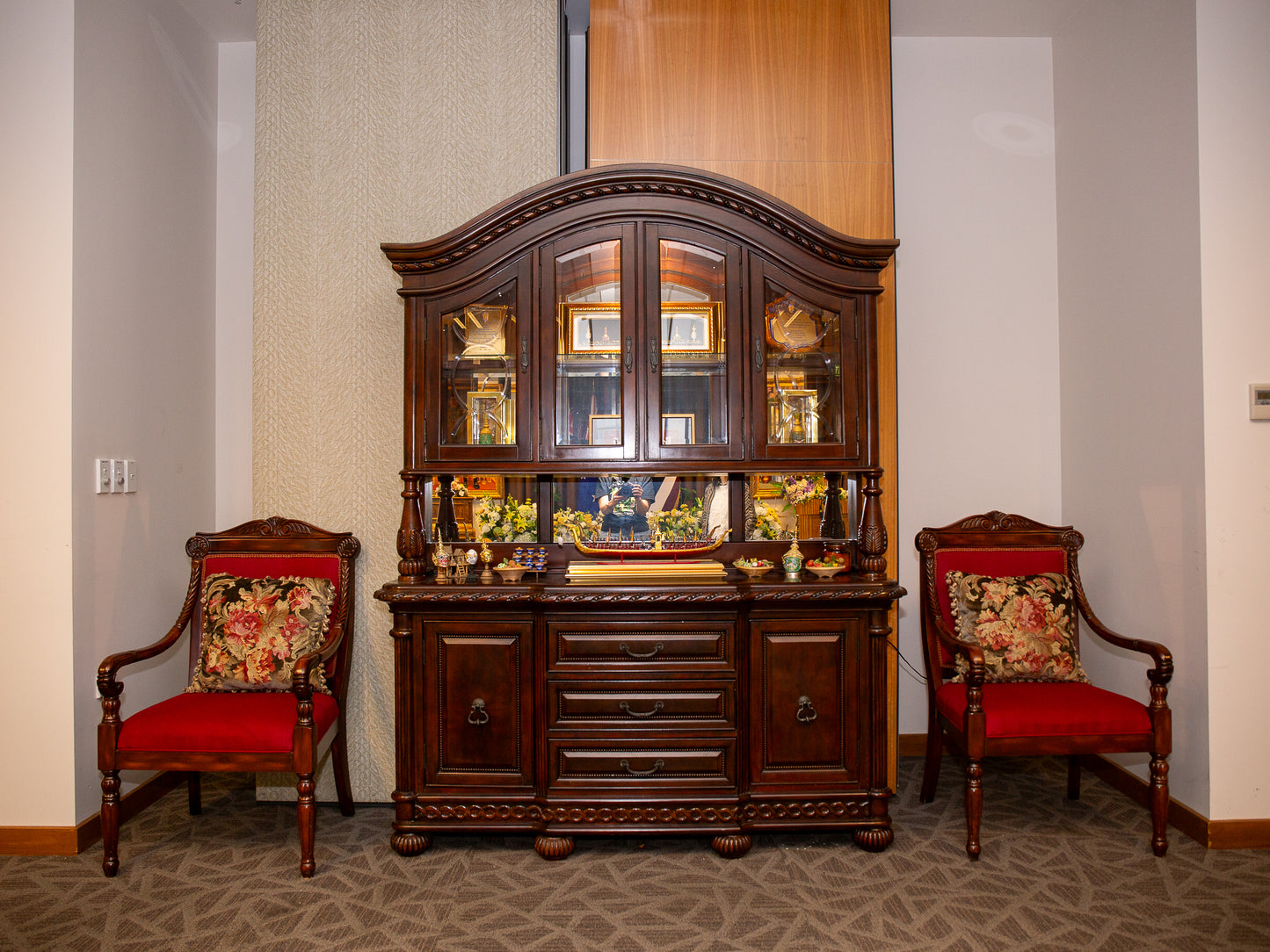 Ornate Wooden China Cabinet with Glass Display and Carved Detailing