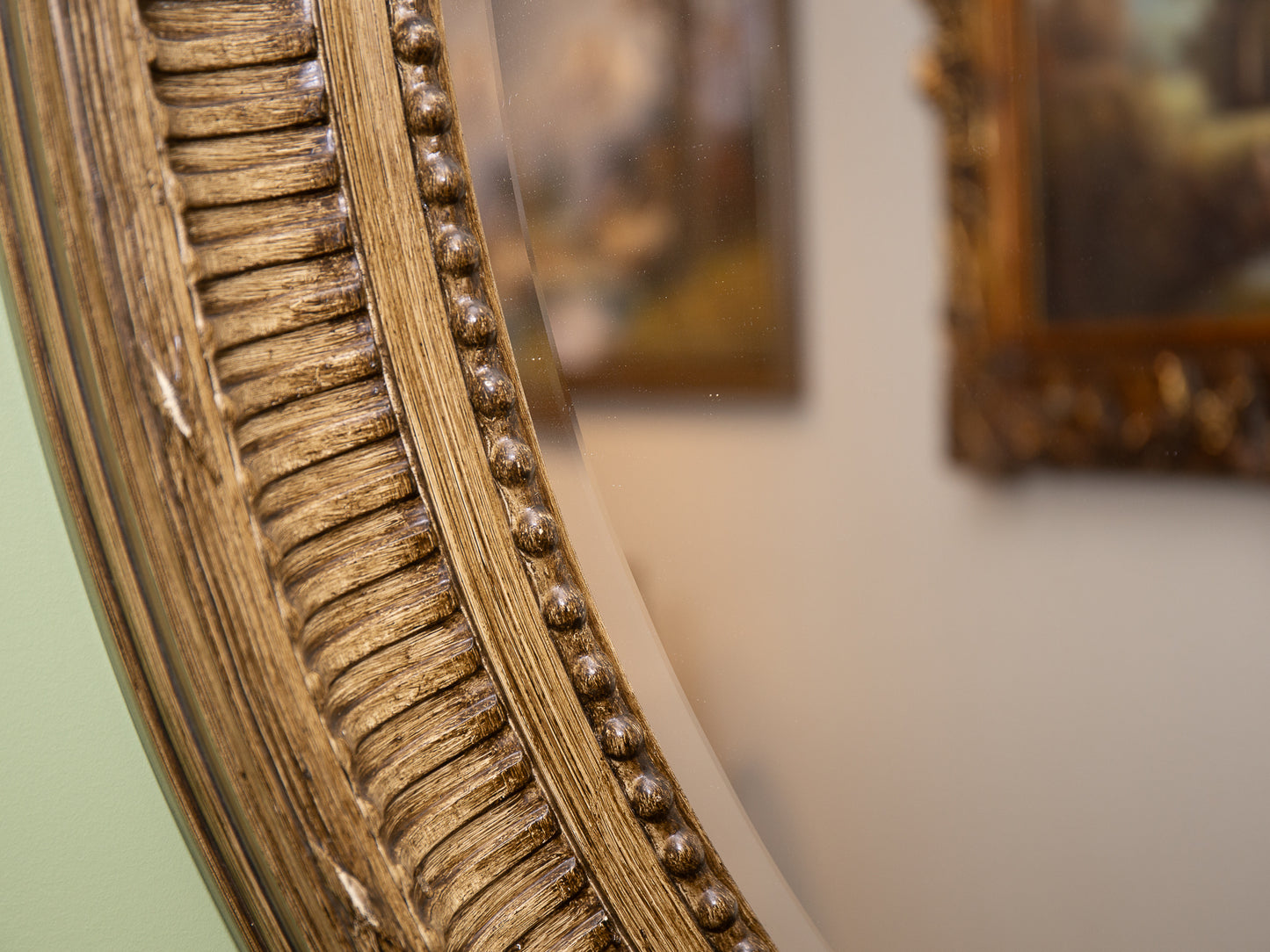 Ornate Oval Gilded Wall Mirror