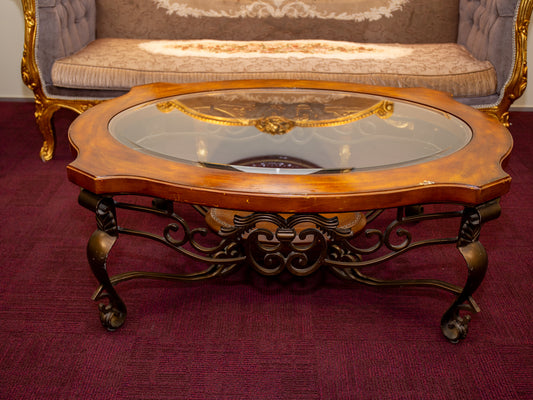 Ornate Oval Glass-Top Coffee Table with Iron Base